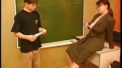 Sexy teacher fucks a young boy.