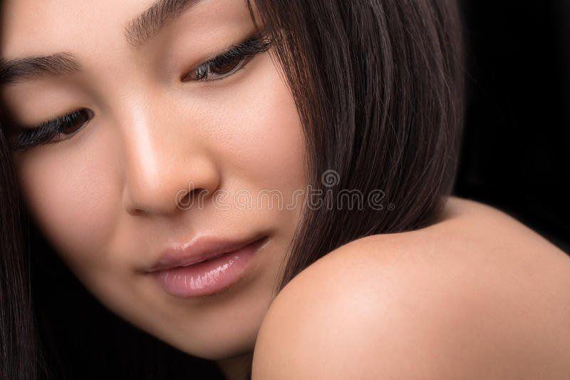 Naked asian woman close up