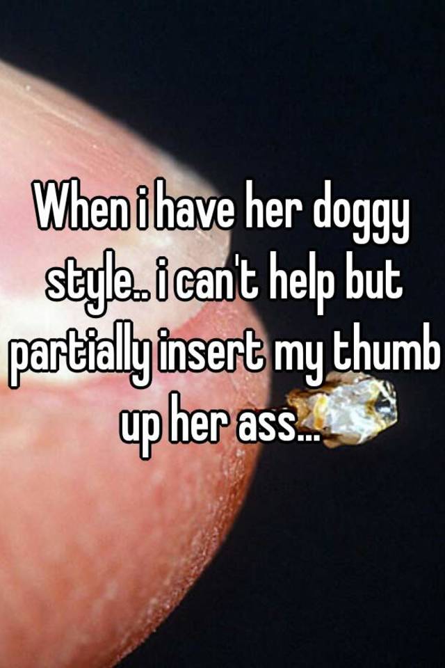 Thumb in her asshole